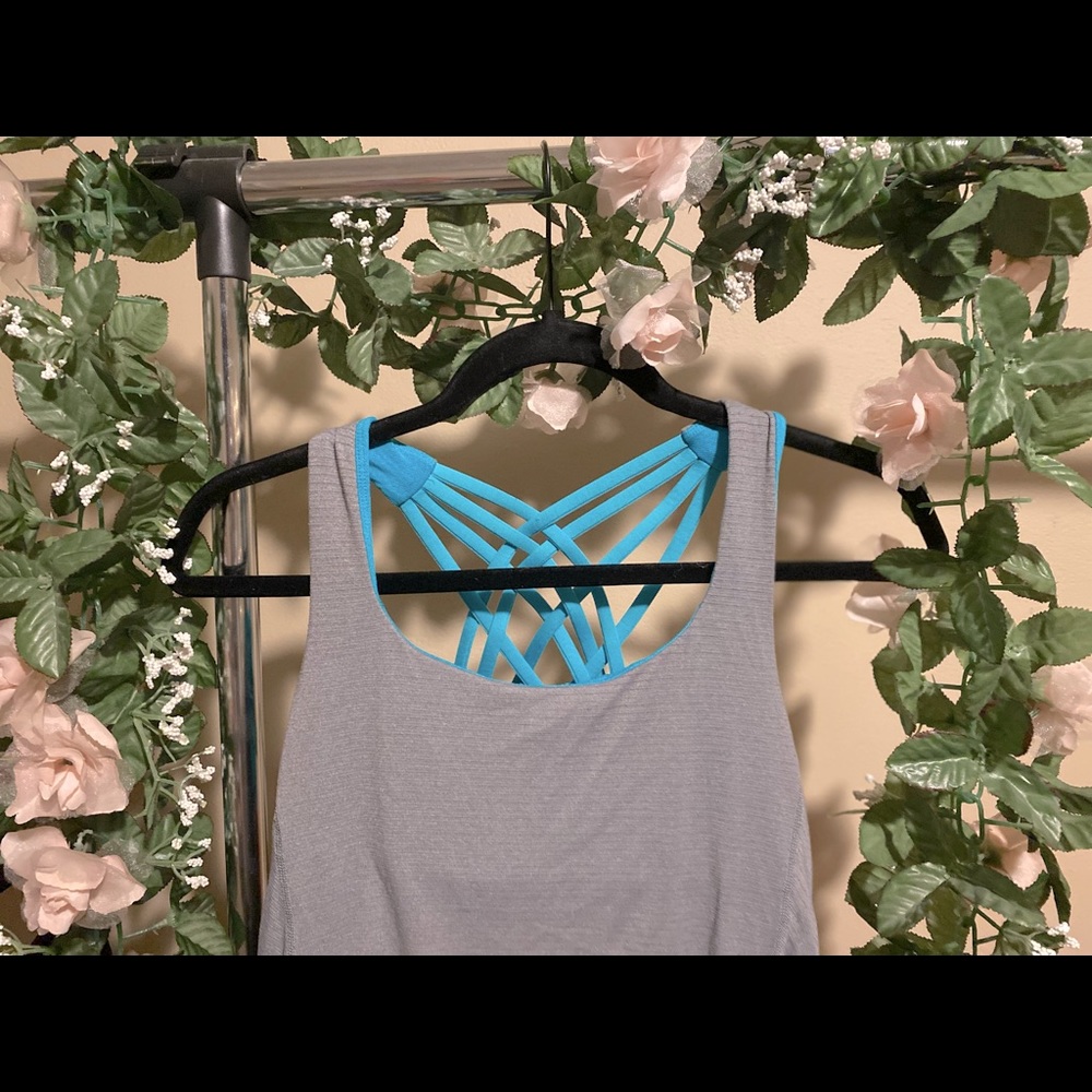 Workout top with a built in bra / size medium / grey and blue